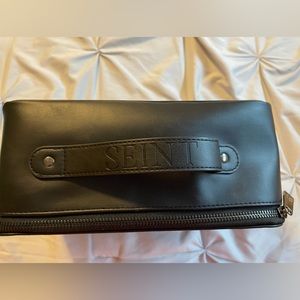 Black Seint makeup case.